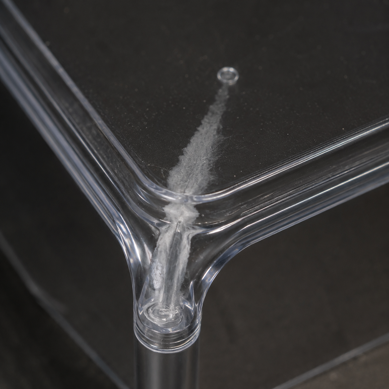 Cold slug mark near the gate of a moulded part